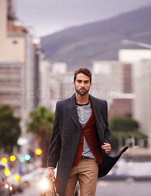 Buy stock photo Man, walking in city and fashion, confidence and serious outdoor with winter coat for style and aesthetic. Urban, chic and edgy with pride, portrait and model in stylish clothing, apparel and outfit