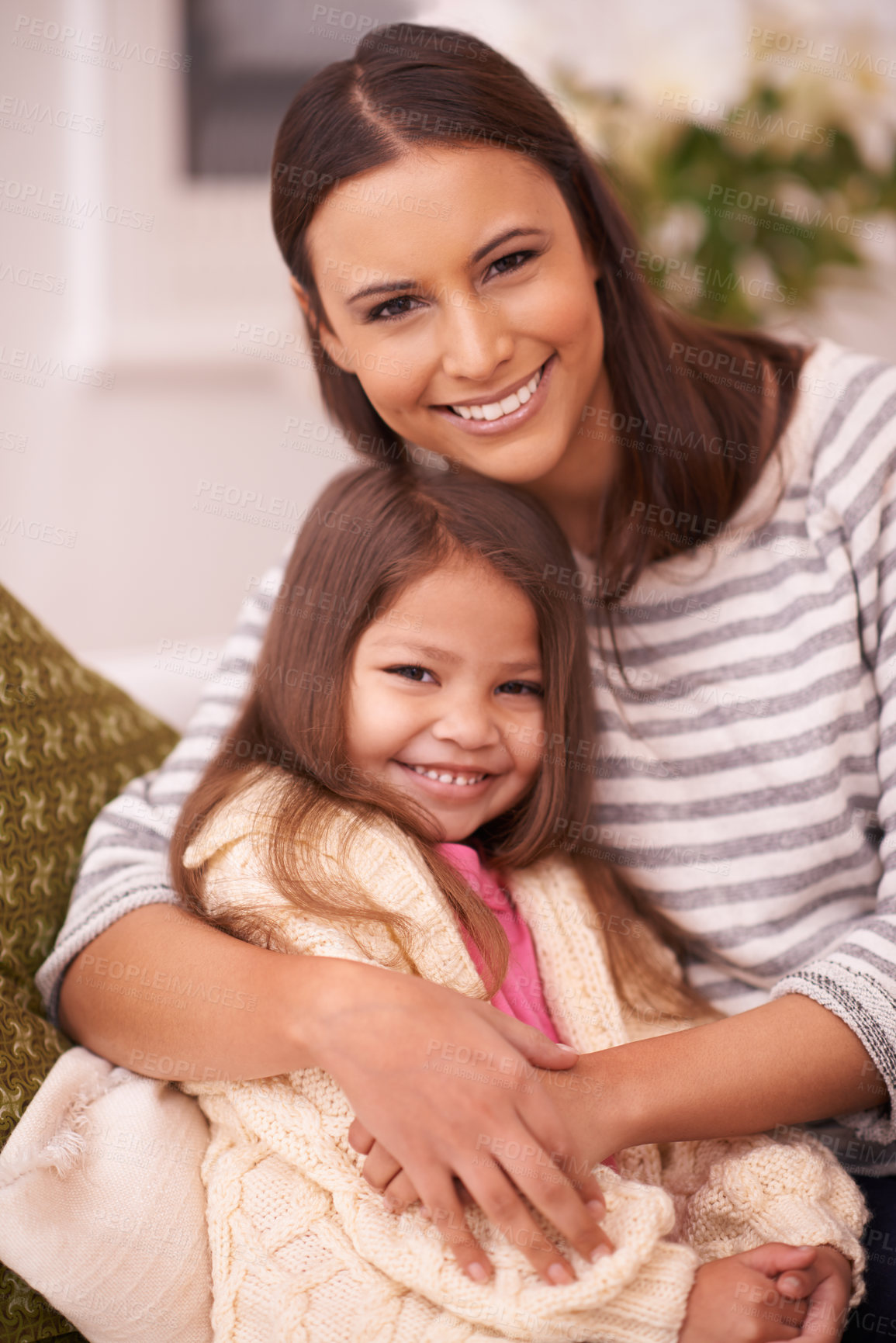 Buy stock photo Living room, mother and girl with smile for hug in home with love, care and happiness. Apartment, mom and daughter in lounge to relax on sofa or couch with embrace for bonding in family house