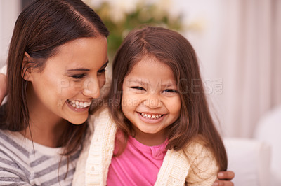 Buy stock photo Portrait, mother and daughter with smile for hug in apartment with love, care and happiness. Home, mom and girl in lounge to relax on sofa or couch for bonding in living room of family house