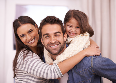 Buy stock photo Portrait of a happy young family at home