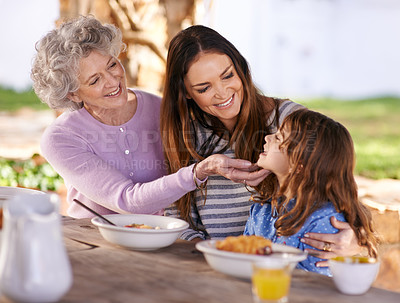 Buy stock photo Family, eating or smile in garden for breakfast with love, gathering or bonding with nutrition or wellness. Grandma, mother or child together in backyard or patio in morning for healthy meal or food 