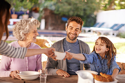 Buy stock photo Happy family, food and breakfast in garden of home for nutrition, bonding and eating together with hosting. Parents, grandma and child with healthy diet, meal and relax at dining table in the morning