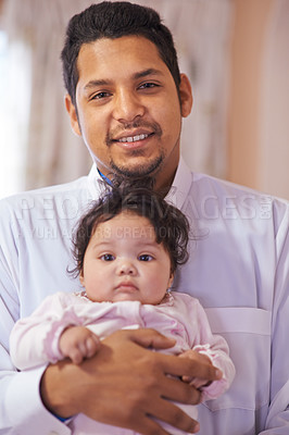 Buy stock photo Portrait, home and father with baby, family and smile with happiness, infant and bonding together. Face, Islamic dad or love with newborn or growth with joy and tradition with hug or eid celebration