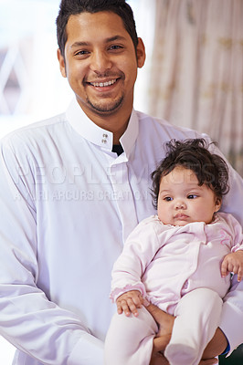 Buy stock photo Muslim, happy and portrait of father with baby in home for bonding, relationship and calm together. Parenting, family and Islamic dad with newborn infant for love, childcare or support in living room