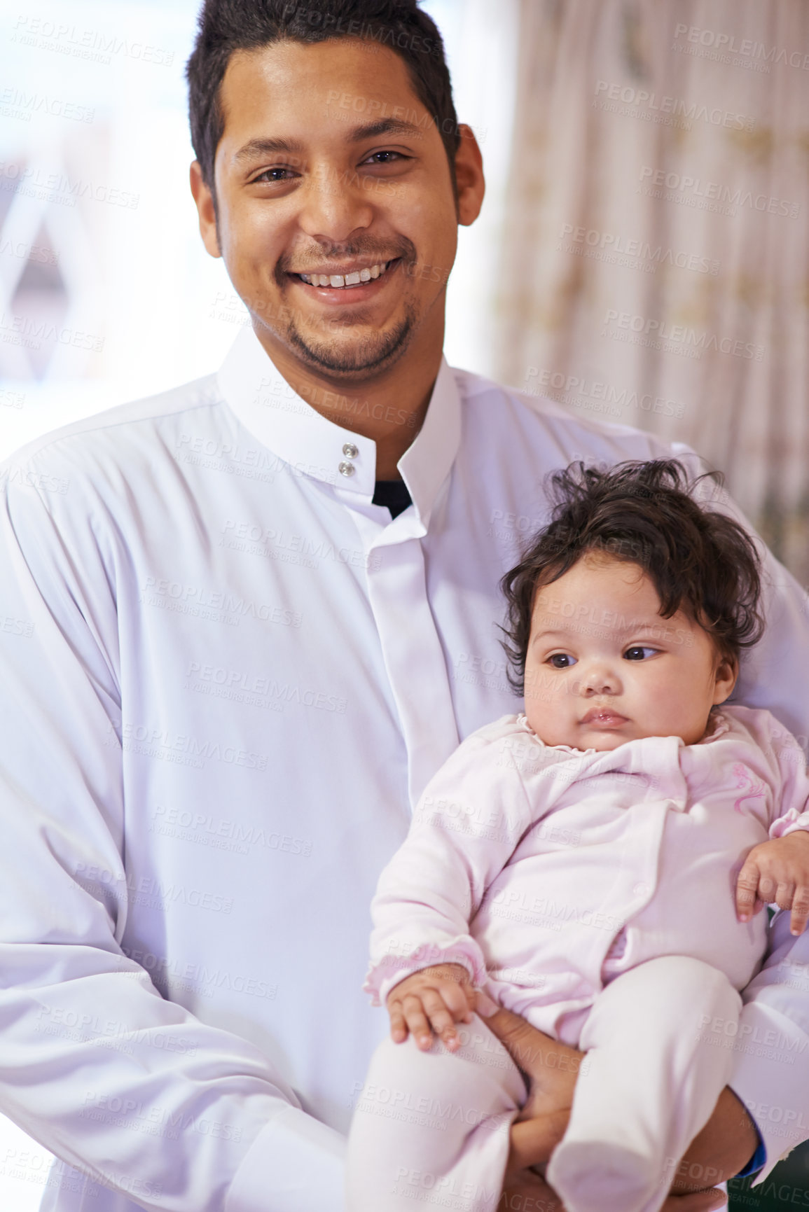 Buy stock photo Muslim, happy and portrait of father with baby in home for bonding, relationship and calm together. Parenting, family and Islamic dad with newborn infant for love, childcare or support in living room