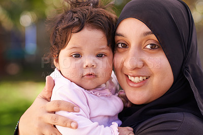 Buy stock photo Shot of a muslim mother and her little baby girl