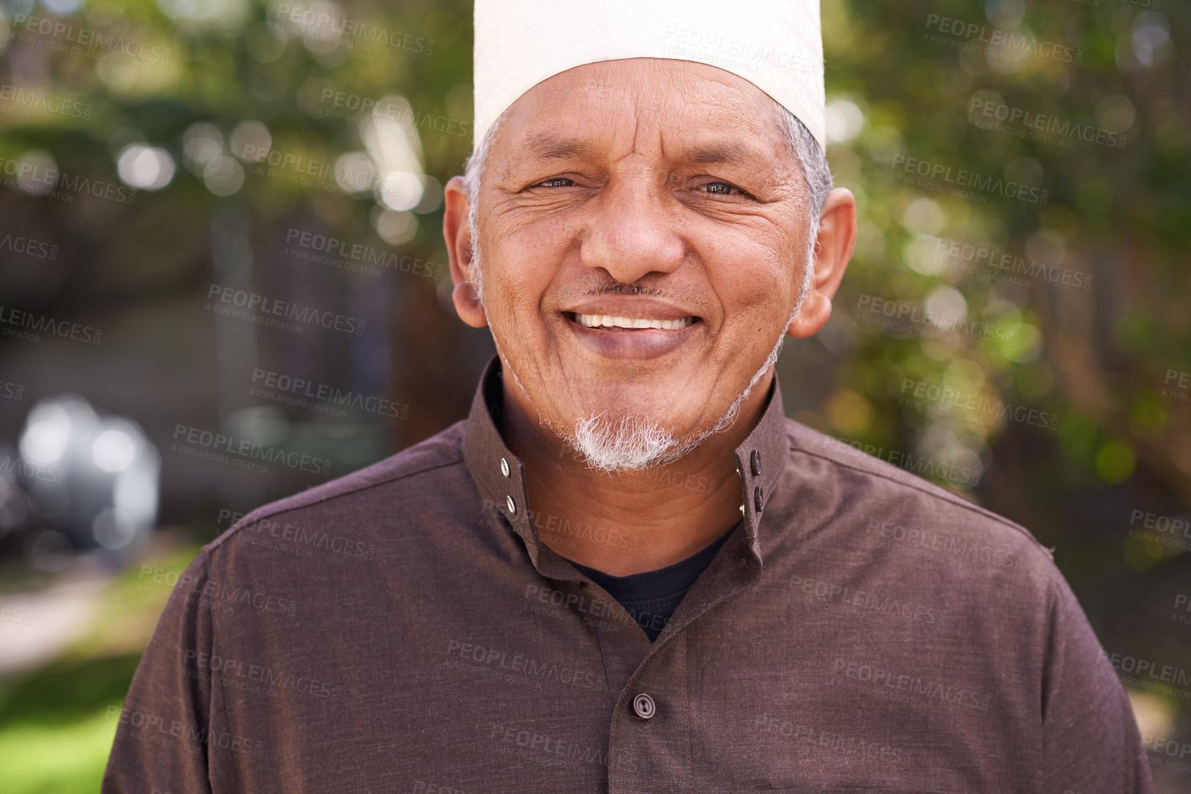 Buy stock photo Happy, muslim and outdoor portrait of man with a smile in garden or relax on holiday in retirement. Mature, arab and person travel on vacation in summer to park to enjoy nature or trees in backyard