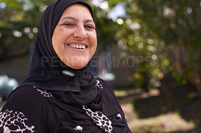 Buy stock photo Muslim woman, portrait and happy in nature in hijab, relax and mature person on vacation in outdoor. Islamic female, smile face and religion in scarf in garden and sunshine in morning on retirement