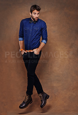Buy stock photo Fashion, jump and studio for male person, face and formal clothing isolated on background. Confidence, stylish and portrait for employee or worker man model, professional or business or trendy outfit