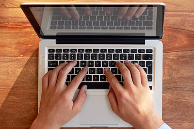 Buy stock photo Cropped shot of a businessman's hands on a laptop keyboard