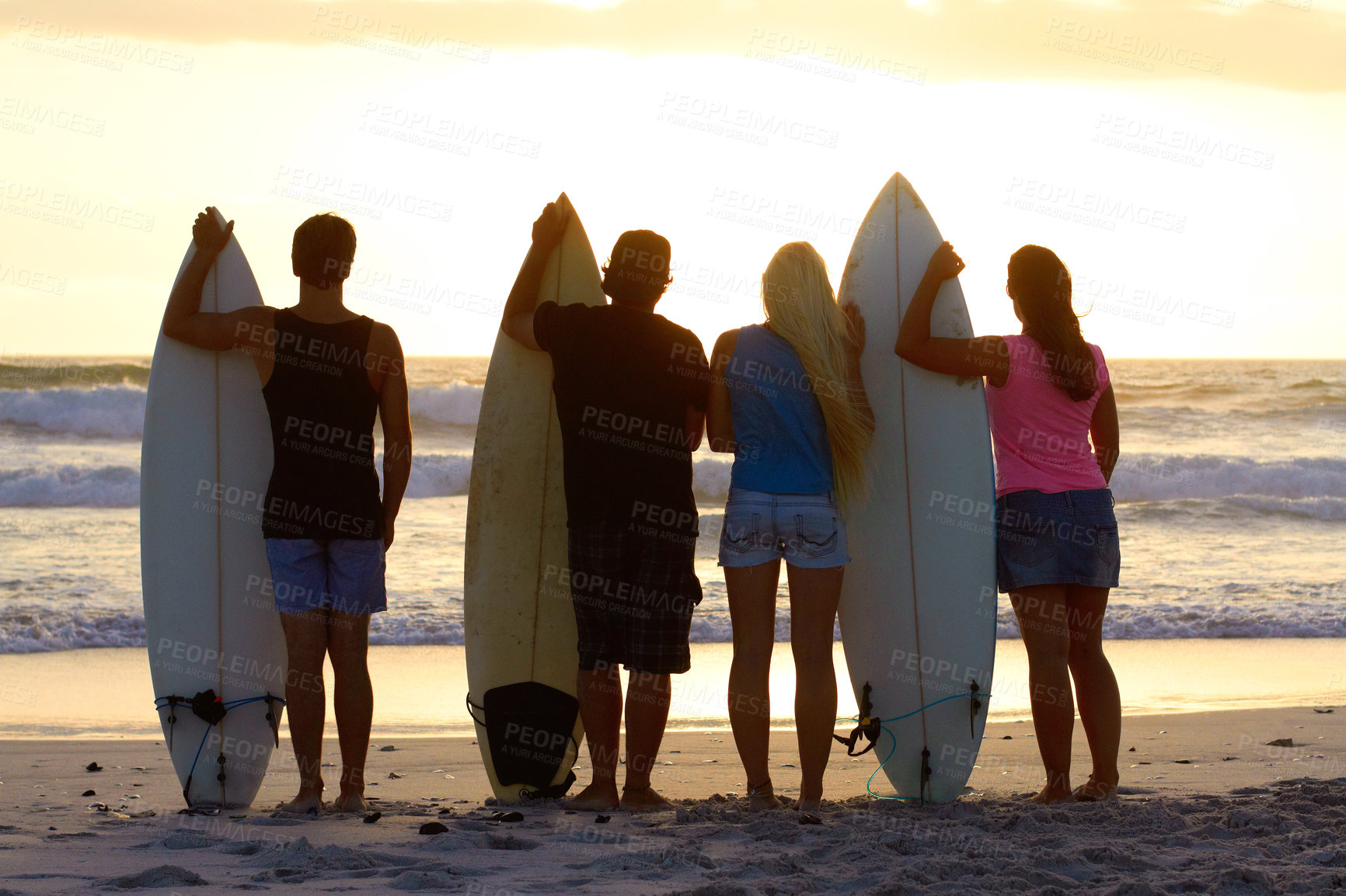 Buy stock photo Shot of surfing friends at the beach