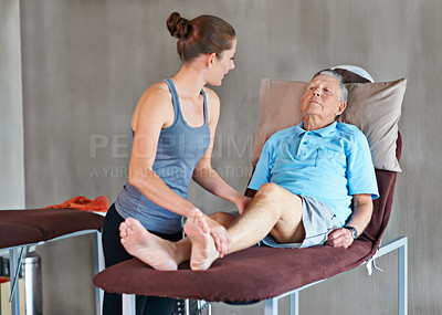 Buy stock photo Therapist, legs and senior patient with physical therapy exercise at rehabilitation center. Medical, help and physiotherapist with elderly man with consultation for muscle injury at healthcare clinic