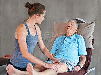 Buy stock photo Therapist, legs and senior man with physical therapy exercise at rehabilitation center. Medical, help and physiotherapist with elderly male patient with consultation for muscle injury at clinic.