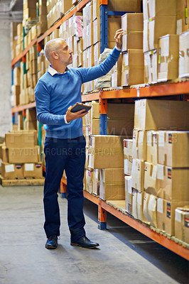 Buy stock photo Boxes, tablet or man in factory for stock or logistics info for a delivery order by shelf in warehouse. Check, inventory or mature manager with product, package or cargo shipping for distribution
