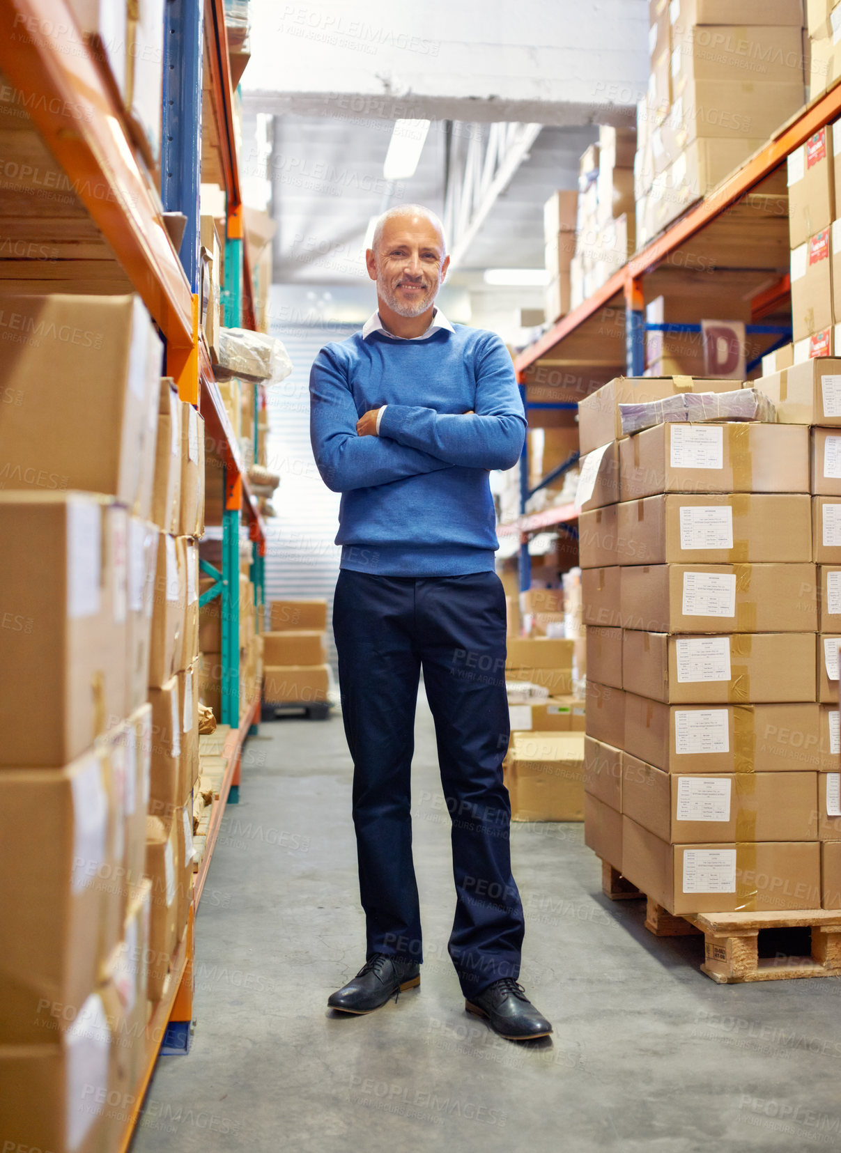 Buy stock photo Portrait of businessman, arms crossed and boxes in warehouse for inventory or freight distribution. Mature manager, confident and happy inspector with stock in logistics industry for supply chain