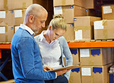 Buy stock photo Logistics, teamwork or clipboard in warehouse with inventory for quality control, service delivery or freight distribution. Senior man, woman or wholesale supplier with stock checklist for inspection