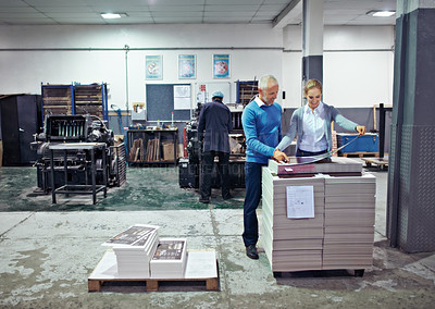Buy stock photo Printing, warehouse and man and woman with paper for teamwork, collaboration or product inspection. Factory, supply chain and people for logistics, manufacturing and industrial production in workshop