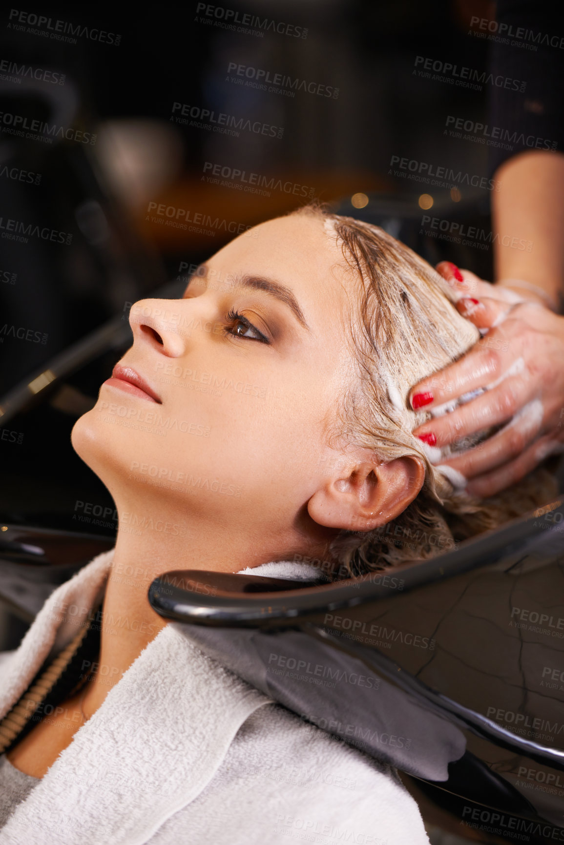 Buy stock photo Shampoo, washing and woman at sink with hairdresser for professional haircare, cleaning or luxury treatment. Grooming, hair care and client at salon basin with soap, water and small business service