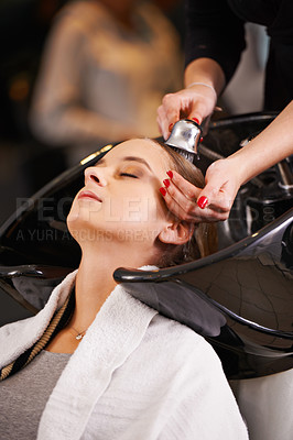 Buy stock photo Shampoo, water and woman at sink with hairdresser for professional haircare, cleaning or luxury treatment. Grooming, hair care and client at salon basin with soap, washing and small business service