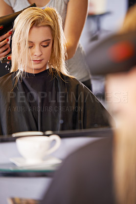 Buy stock photo Woman, hairstylist and dryer in salon, mirror and heat treatment or haircare for grooming. Female person, beauty and appliance for transformation at hairdresser, cosmetics and equipment for texture