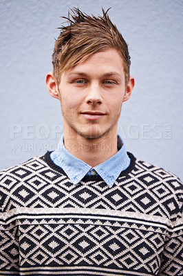 Buy stock photo Portrait, fashion and happy male person, hairstyle and trendy clothing on studio background. Face, smile and spike haircut with casual outfit for man model, hipster or confidence with funky style