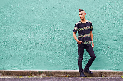 Buy stock photo Man, confidence and serious outdoors for fashion, weekend and casual style for hipster trend. Male person, travel and mockup space by wall background, aesthetic and streetwear or clothes for attitude