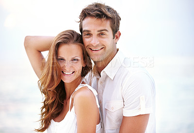 Buy stock photo Happy couple, portrait and holiday on beach for love and travel on honeymoon adventure in sunshine. Man, woman and smile face for bonding in marriage, touch and together on sea vacation in cape town