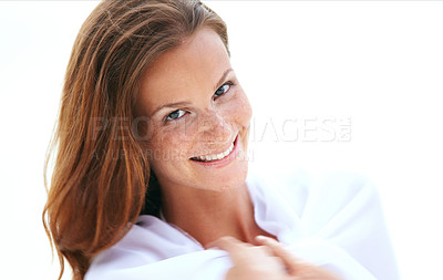 Buy stock photo Stunning young woman smiling as she wraps a sarong around herself - Copyspace