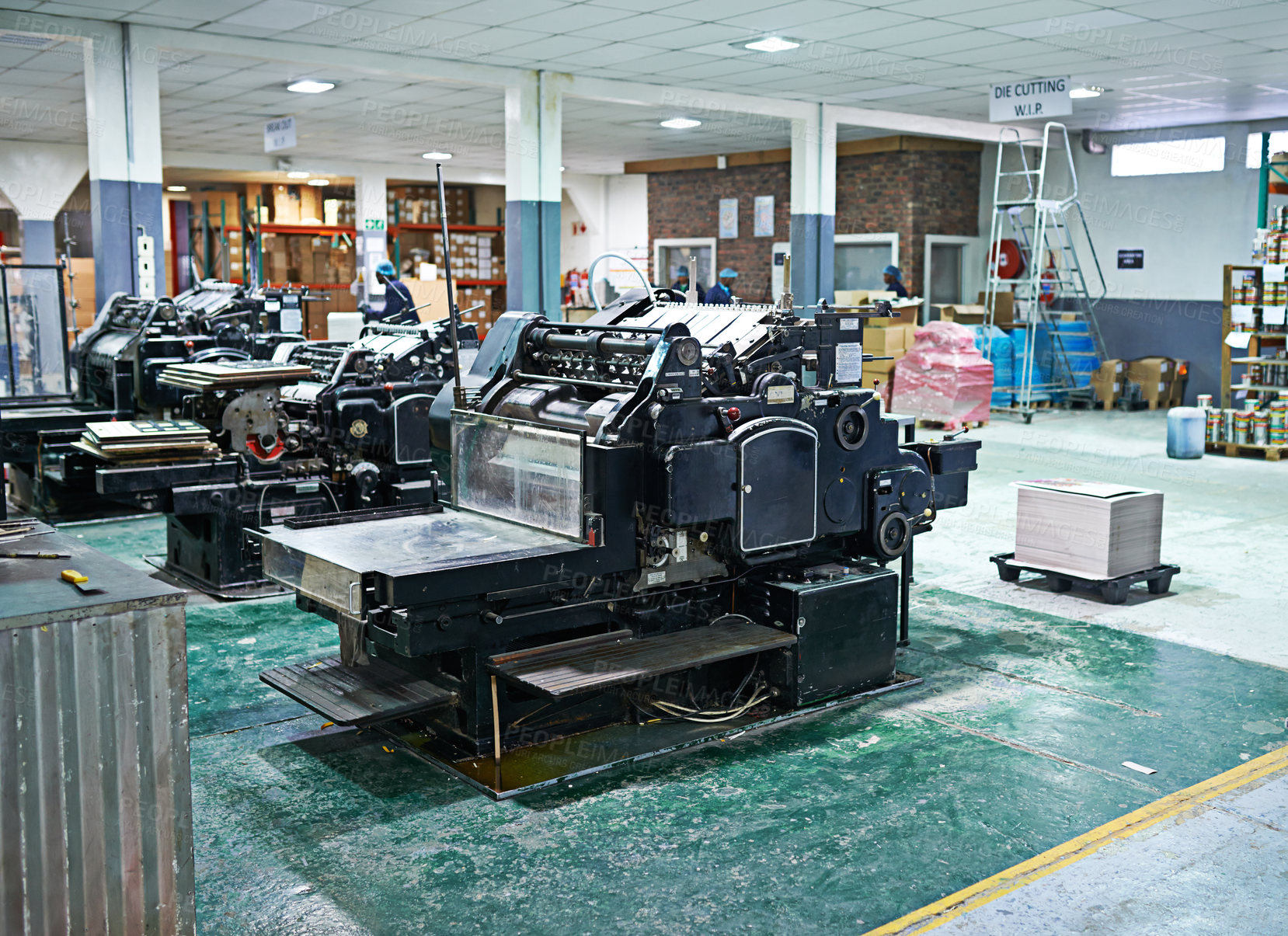 Buy stock photo Industrial, printer and machinery in printing, factory and industry for newspaper, magazine and books. Inside, room and printing with paper, ink and equipment for distribution, media and publication