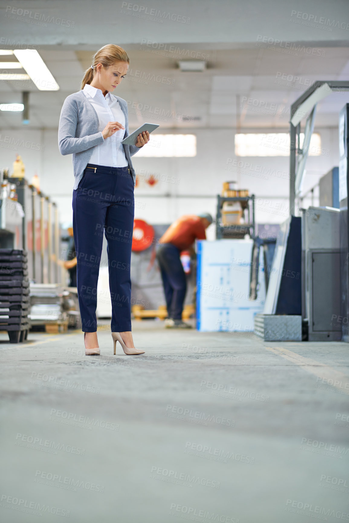 Buy stock photo Woman, tablet and factory for monitoring production process, productivity and manufacturing for distribution. Manager with tech for inspection of supply chain in packaging plant for stock industry
