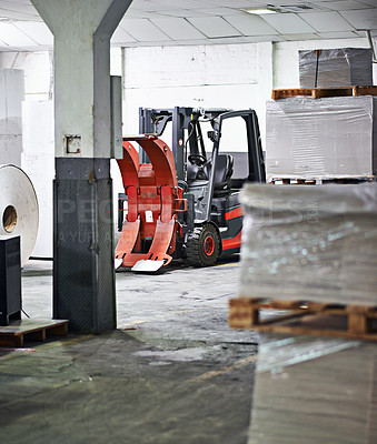 Buy stock photo Warehouse, forklift and manufacturing with distribution of package for wholesale, delivery and supplier. Logistics, storage and factory with machines or equipment for distribution in storehouse
