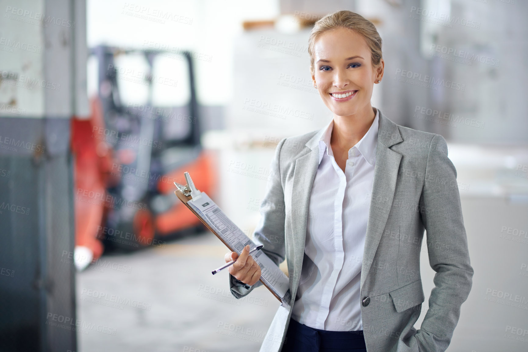 Buy stock photo Business woman, warehouse and clipboard in portrait, production and logistics at shipping company. Manager, happy and checklist for distribution, trade and job in factory, supply chain and industry
