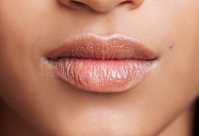 Buy stock photo Closeup of woman, mouth and skin with natural beauty, skincare and wellness with gloss for dermatology. Face, change and balm on lips for moisturizer, cosmetic and collagen with oil or serum for glow