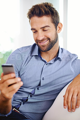 Buy stock photo Businessman, phone and reading an email in home, communication and networking for company. Happy male person, smile and notification on app for conversation, website and internet for information