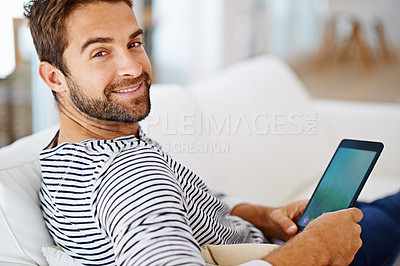 Buy stock photo Relax, portrait or man with tablet for movies, streaming or watching fun videos on a film website in home. Smile, online or happy person with technology to download on app or reading ebook on couch