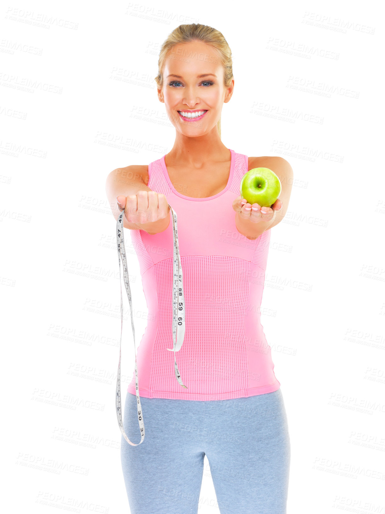 Buy stock photo Woman, portrait and studio with apple and measuring tape for healthy or slim body, dietitian or nutritionist for fit figure. Person, happy and fruit for diet and exercise for wellness or self care