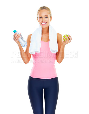 Buy stock photo Girl, portrait and apple or water for wellness in studio with smile, healthy diet or nutrition for fitness goal. Athlete, person and happy with fruit to lose weight or body detox on white background