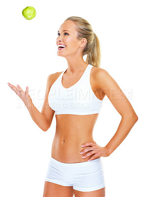 Buy stock photo Woman, apple and studio for diet nutrition on white background for lose weight, fiber or training. Female person, smile and fruit snack with mockup space for health benefit or progress, goal or meal