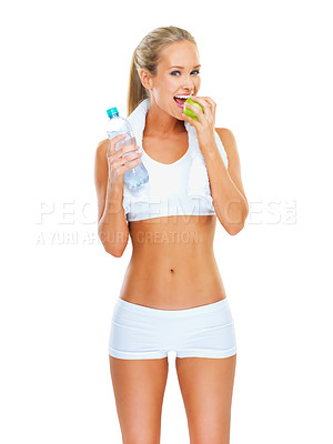 Buy stock photo Woman, portrait and eating apple for healthy diet on studio for weight loss nutrition, exercise or white background. Female person, face and water bottle on mockup space for snack, sports or training