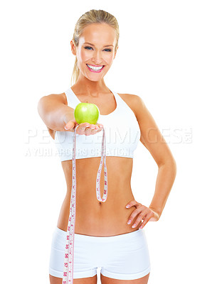 Buy stock photo Woman, portrait and health with apple, measuring tape and healthy body in white background. Confident, female person and beauty for fitness, wellness and shape in smiling, studio and backdrop
