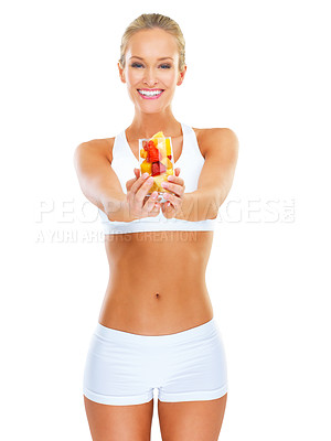 Buy stock photo Fitness, woman and healthy fruit in portrait for nutrition, diet and drink against a white background. Female athlete, glass of food and smile for delicious tasty and nourishing workout treat