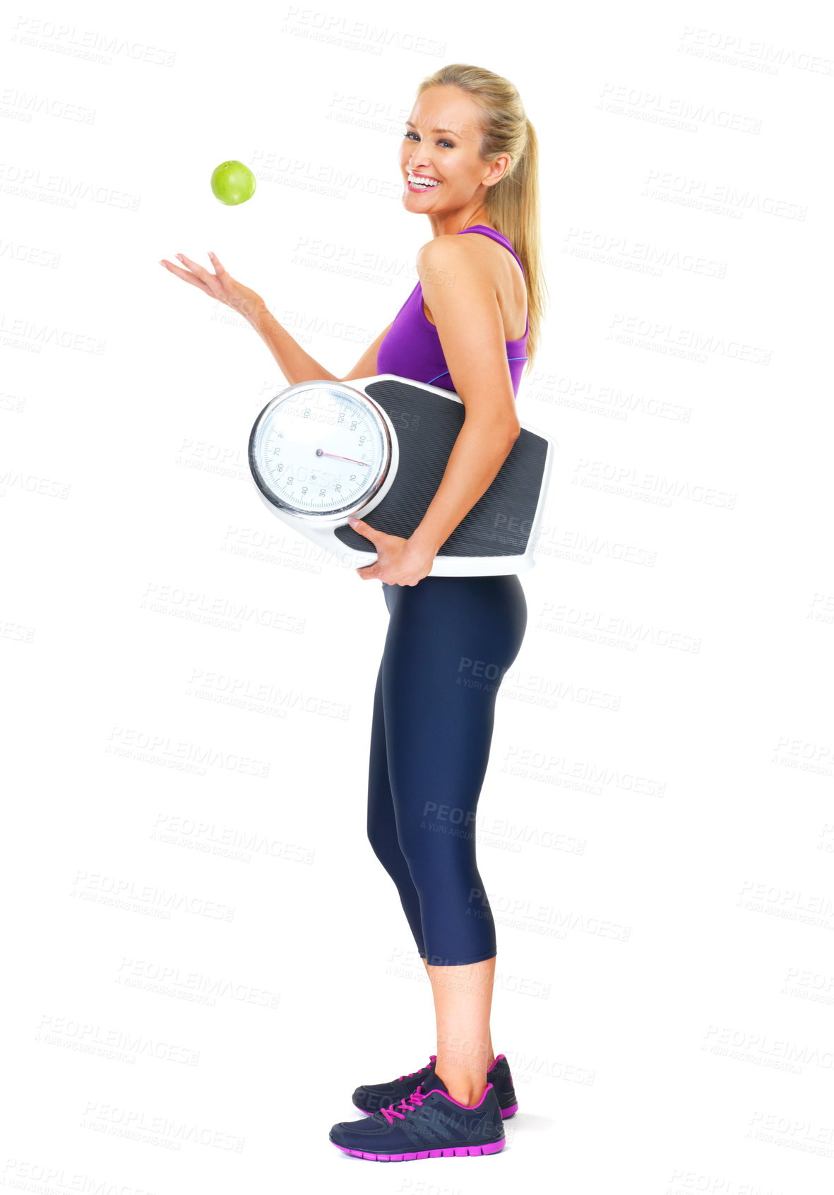 Buy stock photo Portrait, scale and apple with woman, fitness and nutrition isolated on a white studio background. Full body, person or model with weight loss or fruit for wellness or healthy with diet plan or smile