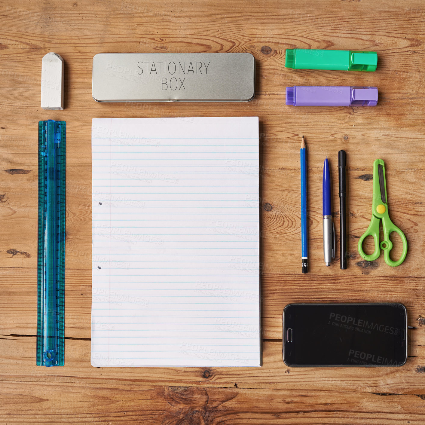 Buy stock photo School supplies, stationary or equipment for young working and studying students top view. Assortment, variety or array of education essentials items including a phone and notebook on a wooden desk