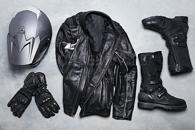 Buy stock photo High angle shot of biker gear against a gray background