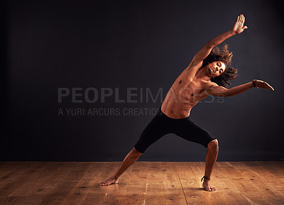 Buy stock photo Dancer, performance and man in studio for creative, movement and rhythm on floor. African male isolated and shirtless for art deco and stretch body for theater, ballet or jazz on dark background    