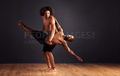 Buy stock photo Performance, dancer and contemporary in studio for balance training, competition and routine. Teamwork, collaboration and diverse young men for professional, movement and workout with dark background