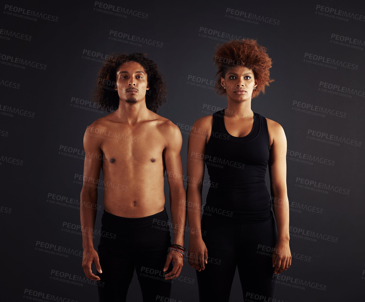 Buy stock photo Dancer, couple and portrait for creative and contemporary art on stage for performance. African man and woman and serious for art deco in theater for ballet or jazz on dark background in studio