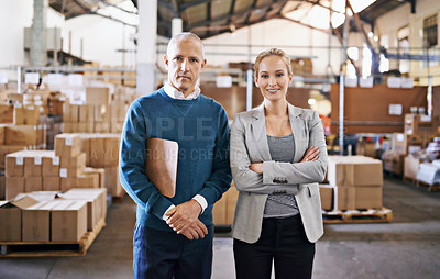 Buy stock photo Man, woman and portrait of business people in storage warehouse with confidence, logistics or distribution. Partnership, shipping and team at cargo inventory factory with boxes, pride and leadership