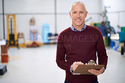 Buy stock photo Portrait of a factory manager standing with a clipboard 