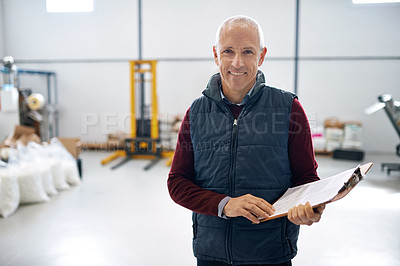 Buy stock photo Man, smile and manager of warehouse with clipboard for stock taking in manufacturing, distribution and package for supplier. Portrait, mature and logistics in factory with machines in storehouse